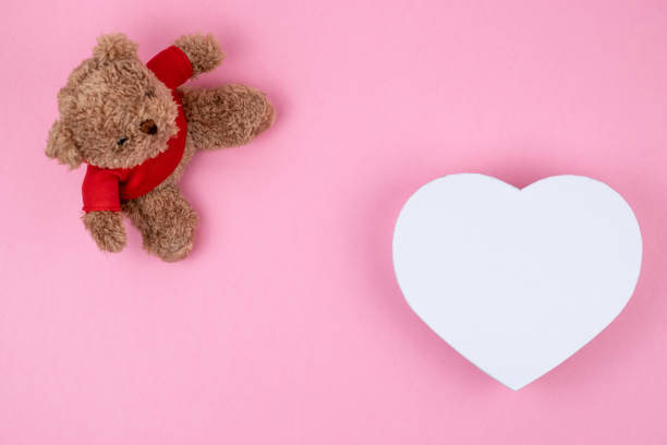 istock Teddy bear, white box hearts shaped, Valentines Day gift. Present for the christmas, thanks giving day, birthday holiday. 1161861580