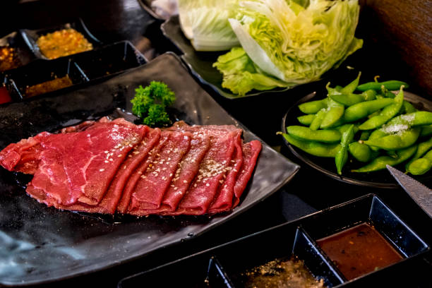 istock Fresh beef fillet with ingredients in cooking 1161879751