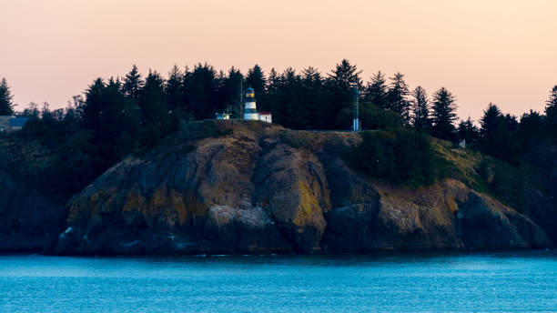 istock Cape Disappointment Lighthouse, the first lighthouse in the Pacific Northwest, on Cape Disappointment, near the mouth of the Columbia River in Washington State. 1161880753