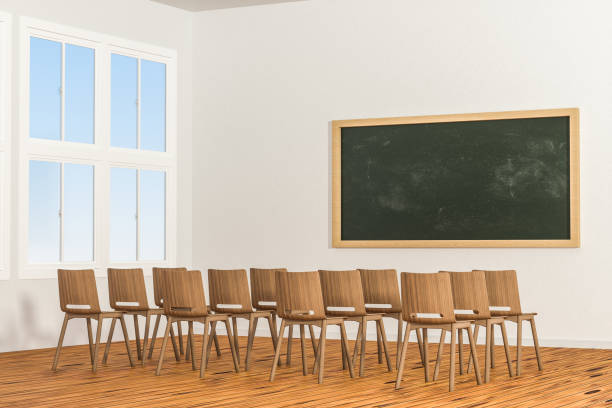 istock A classroom with a blackboard in the front of the room, 3d rendering. 1161881807