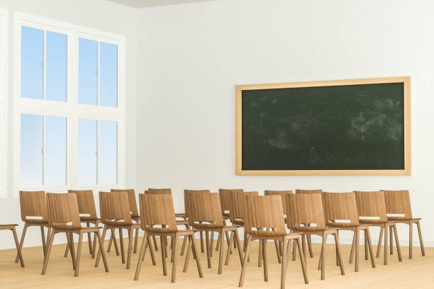 istock A classroom with a blackboard in the front of the room, 3d rendering. 1161881874