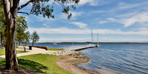 istock Waterfront maritime parkland marina/dock with boats. 1161883684