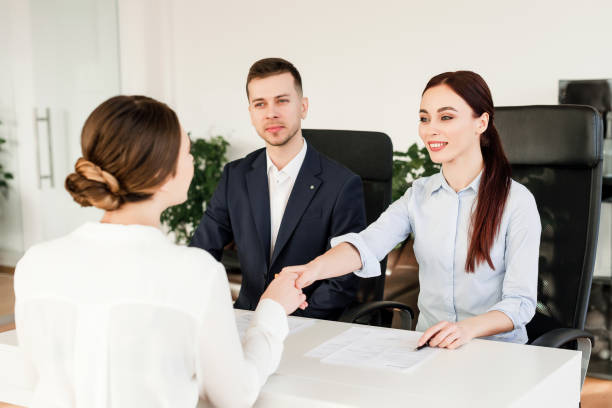 istock office workers discussing business strategy in a company 1161883732