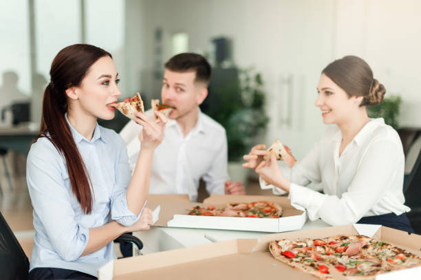 istock office workers discussing business strategy in a company 1161883771