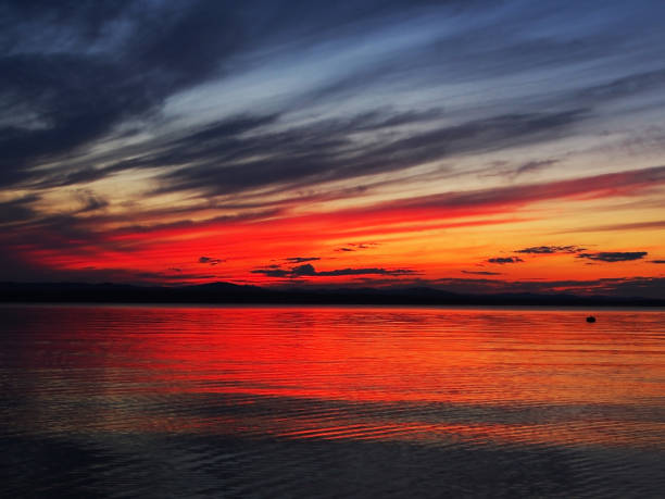 istock red sunset sky over the lake, dramatic lighting 1161884813