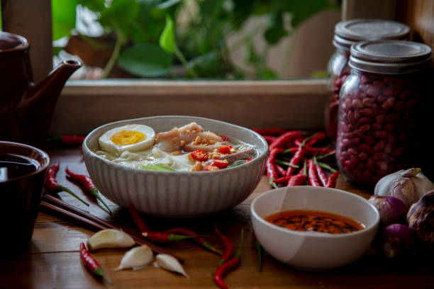 Chinese homemade cooked noodles, on table beside window