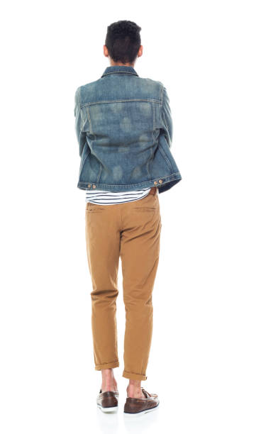 istock Good looking tall black man wearing denim jacket - arms crossed 1161890186