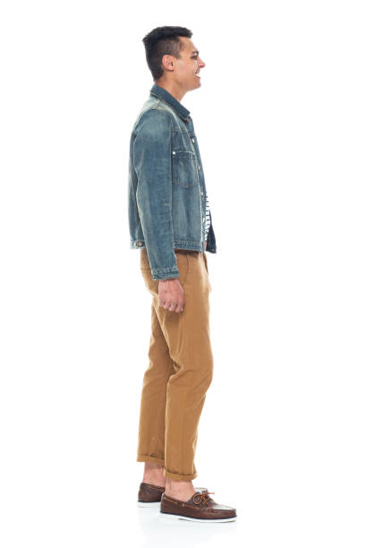 istock Good looking tall black man wearing denim jacket - hands by side 1161890207