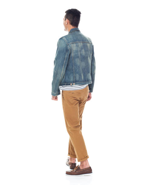 istock Good looking tall black man wearing denim jacket - hands by side 1161890230