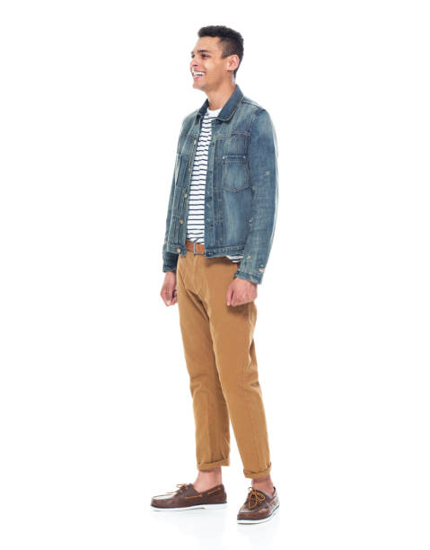 istock Good looking tall black man wearing denim jacket - hands by side 1161890242