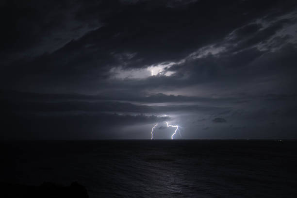 istock Strong Tropical Storm Lightning over the Ocean 1161891003