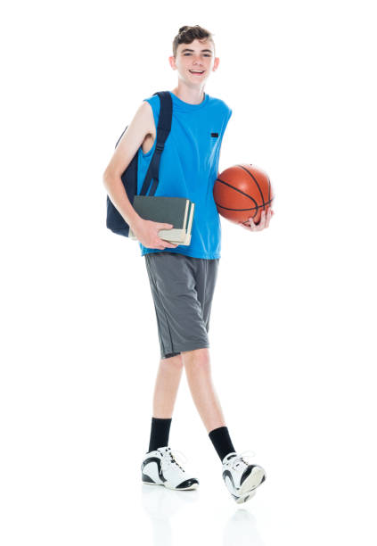 istock 13 year old male basketball player who is also a student 1161891071