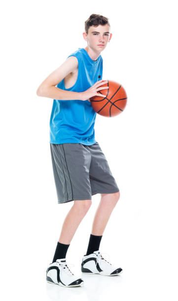 istock 13 year old male basketball player 1161891147