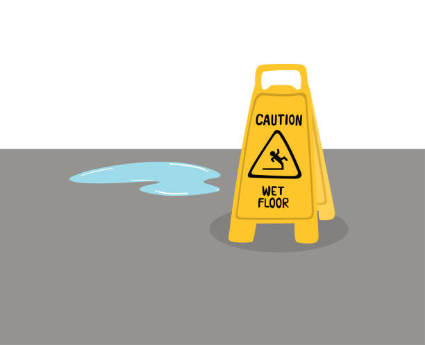 предупреждающие знаки остерегайтесь скользких полов, размещенных на полу с водой. - vertebrate water puddle water surface stock illustrations