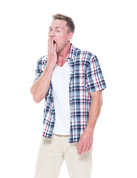 istock Handsome man in shirt and shorts is tired 1161892111