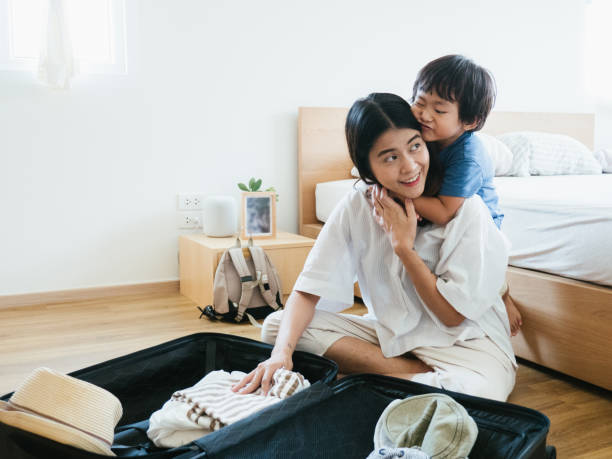 istock Family Is Packing For Vacation 1161892407