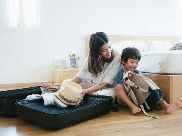 istock Family Is Packing For Vacation 1161892495