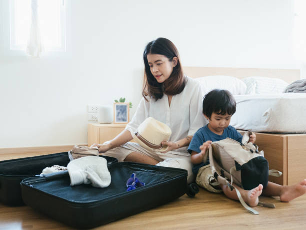 istock Family Is Packing For Vacation 1161892533