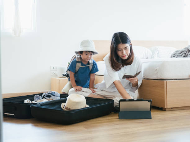 istock Family Is Packing For Vacation 1161892539