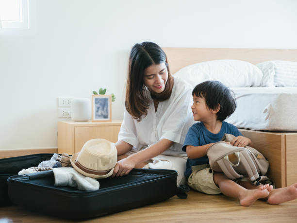 istock Family Is Packing For Vacation 1161893182