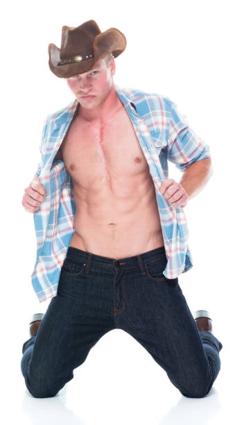 魅力的なカウボーイダウン低 - male stripper ストックフォトと画像