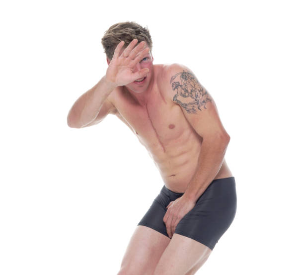 istock Handsome man wearing black underwear and is embarassed 1161895679
