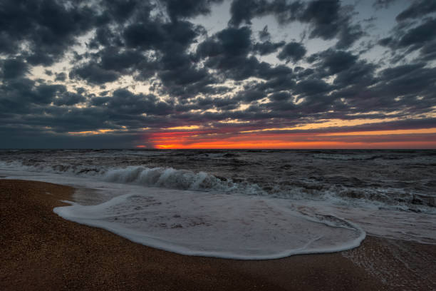 istock Sea shore at colorfuf sunset time 1161897601