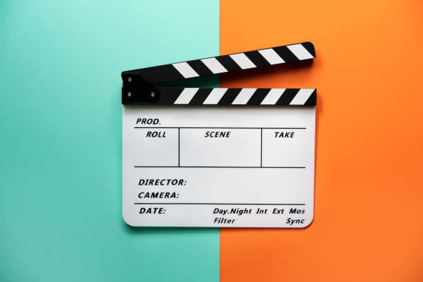 movie clapper on color table background; film, cinema and video photography concept movie clapper on color table background; film, cinema and video photography concept film crew photos stock pictures, royalty-free photos & images