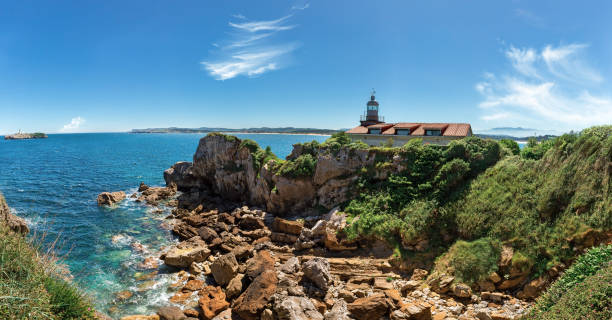istock lighthouse on the peninsula in Santander 1161898856