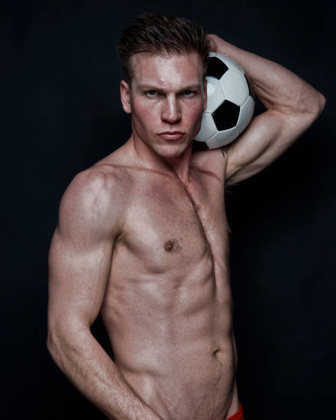 istock Sexy male soccer player 1161902540