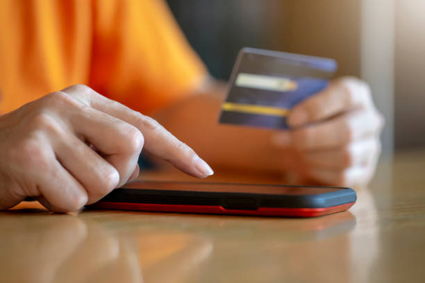 istock Shopping online payment with credit card , man using mobile smartphone ,  business e-commerce and application concept 1161902927