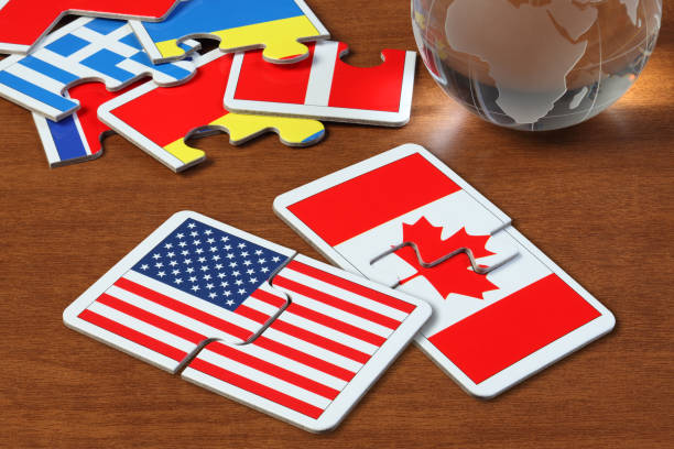 istock America and Canada Flags in puzzle 1161911634