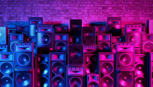 Speakers on the background of an old brick wall in the enon light Speakers on the background of an old brick wall in the enon light, 3d illustration rock n roll music speakers stock pictures, royalty-free photos & images