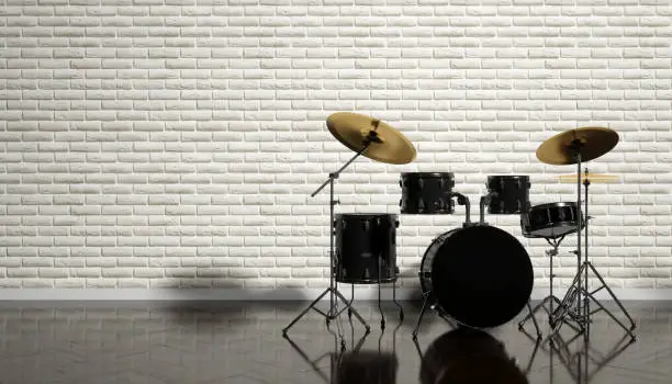 Photo of drum kit on a beautiful beige background