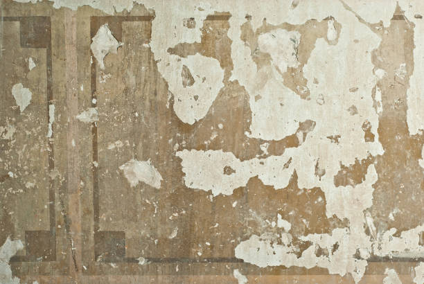istock The texture of an old concrete wall with drawings and patterns. 1161913508