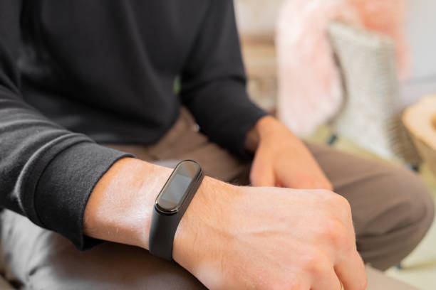 istock Fitness band on human's hand. 1161913648