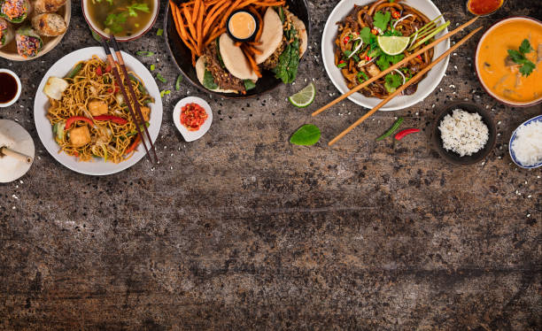 istock Asian food background with various ingredients on rustic stone background , top view. 1161913653