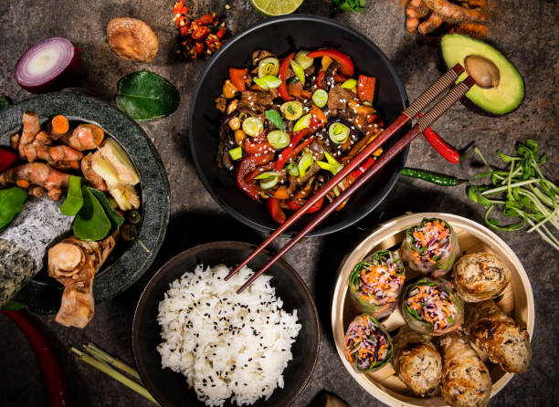 istock Asian food background with various ingredients on rustic stone background , top view. 1161913654
