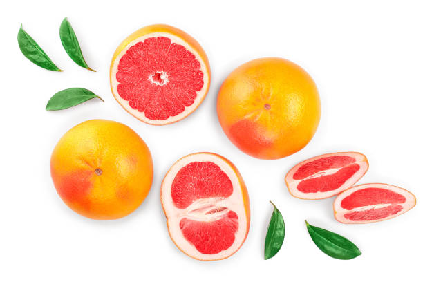 istock Grapefruit and slices with leaves isolated on white background. Top view. Flat lay pattern 1161914036