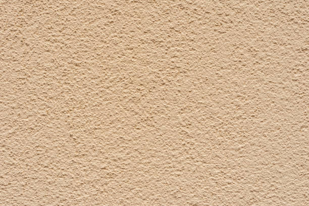 istock Texture of a concrete wall with cracks and scratches which can be used as a background 1161915135