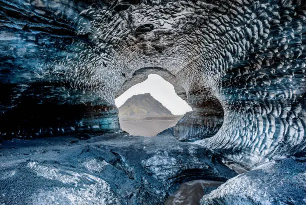 Blue crystal ice cave, underground beneath the glacier in Iceland, Europe
