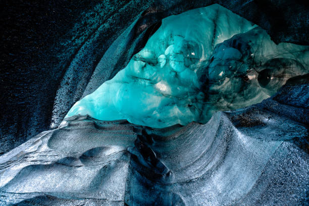 istock Blue crystal ice cave, underground beneath the glacier in Iceland 1161915694
