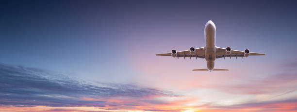 istock Commercial airplane jetliner flying above dramatic clouds. 1161916291