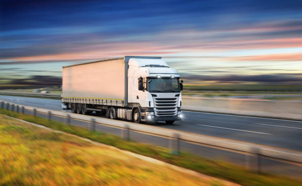 istock Truck with container on road, cargo transportation concept. 1161916785