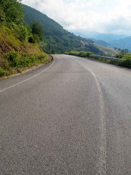 istock Empty asphalt road to the background blue sky 1161919504
