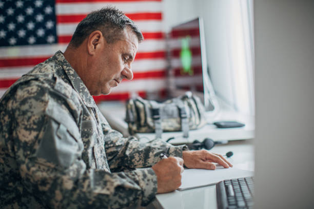 istock Senior soldier writing report 1161924875