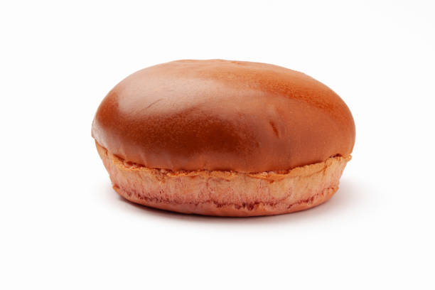 istock Homemade burger bun on white 1161927425