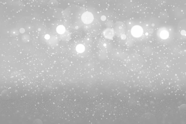 istock beautiful sparkling glitter lights defocused bokeh abstract background with sparks fly, festival mockup texture with blank space for your content 1161927480