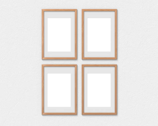 istock Set of 4 vertical wooden frames mockup with a border hanging on the wall. Empty base for picture or text. 3D rendering. 1161928824