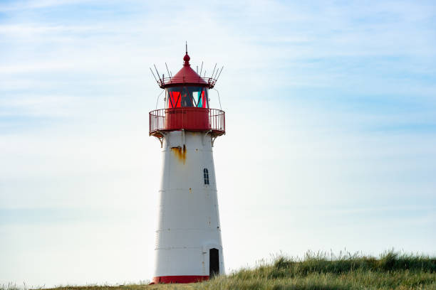 istock Lighthouse red white on dune. Sylt island – North Germany. 1161928948